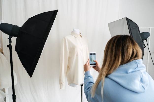 circular economy second hand fast fashion sustainable fashion shop owner taking pictures second 72482 2534